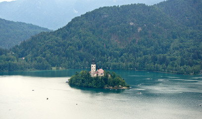 Aerial view of Lake Bled, Julian Alps mountains and church on the island, Bled, Slovenia