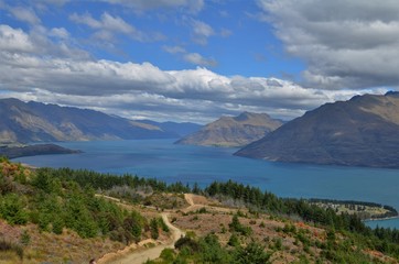 Fototapeta na wymiar walkway to Queenstown Hill summit with view on Lake Waktipu, New Zealand