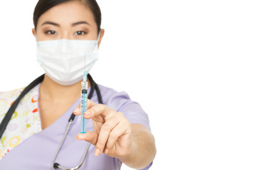 This will hurt a bit. Studio portrait of a female doctor holding out a syringe isolated on white copyspace on the side