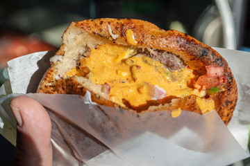 Arais with amba sauce on top