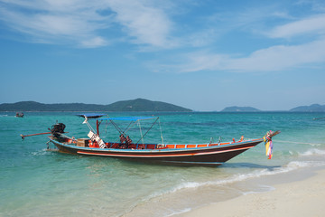 Naklejka na ściany i meble Wooden longtail boat in Thailand