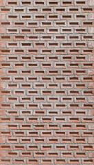 Modern brick wall with decorative classic running bond and cement mortar symbol, Red wall made of special rustic bricks 