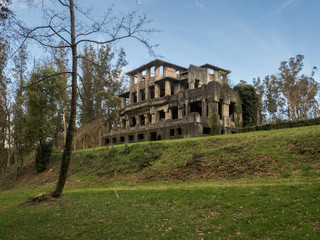 Fototapeta na wymiar Ruins of Cesuras Sanatorium in Oza de los Rios - Spain