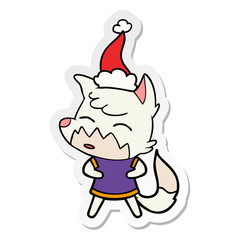 sticker cartoon of a fox wearing santa hat
