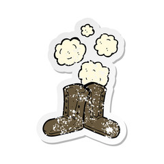 retro distressed sticker of a old boots cartoon
