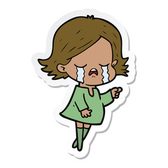 sticker of a cartoon girl crying