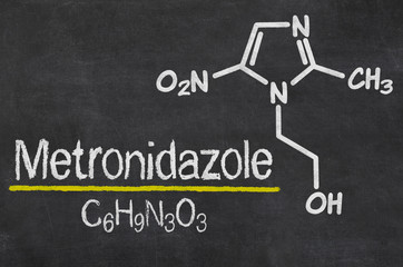 Blackboard with the chemical formula of Metronidazole