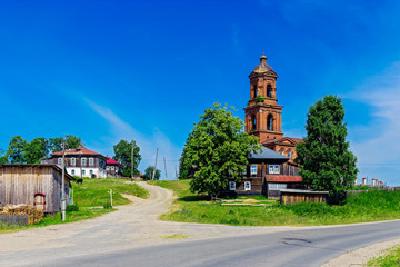Fototapeta na wymiar old church with a bell tower in the village