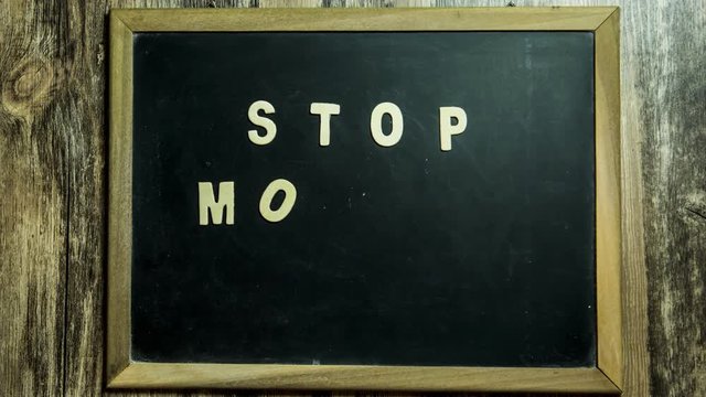 Stop motion of stop motion picture words on blackboard, in studio Chiangmai Thailand