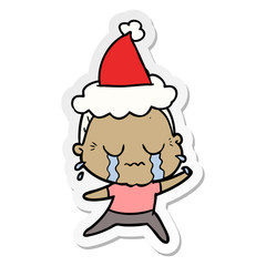 sticker cartoon of a crying old lady wearing santa hat