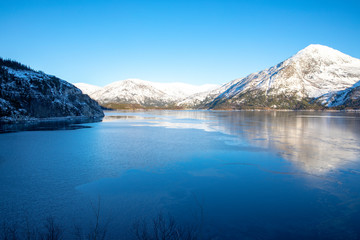 Naklejka na ściany i meble Cold and quiet on the fjord - Norway