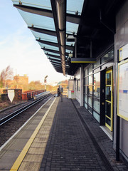 Naklejka na ściany i meble the platform of a train station
