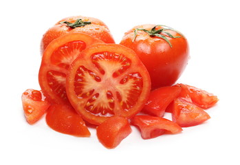 Fresh ripe, red tomato slices isolated on white background