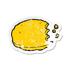 distressed sticker of a cartoon cookie