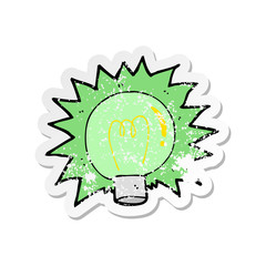 retro distressed sticker of a cartoon flashing green light bulb