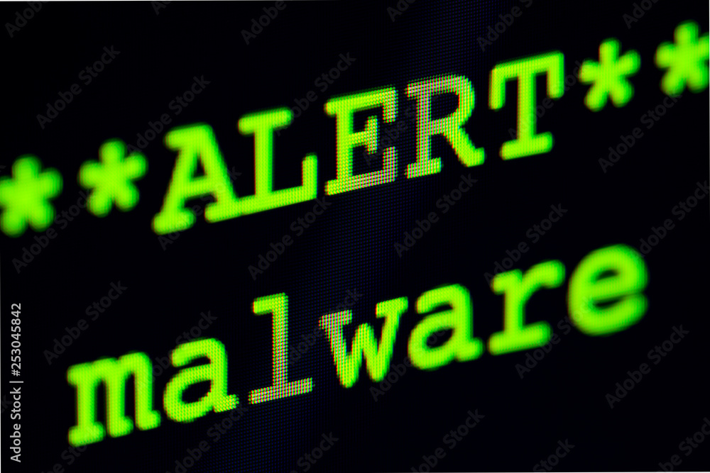 Poster computer screen with malware alert.