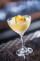 Cocktail drink frozen margarita at barcounter in night club or restaurant