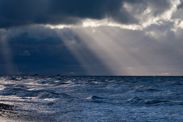 Stormy clouds above Baltic sea in winter time, Latvia coast.