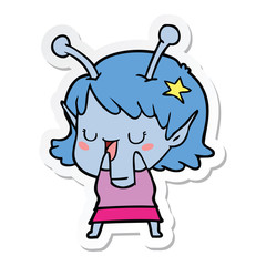 sticker of a happy alien girl cartoon