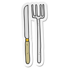 sticker of a cartoon knife and fork