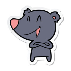 sticker of a laughing bear with crossed arms cartoon
