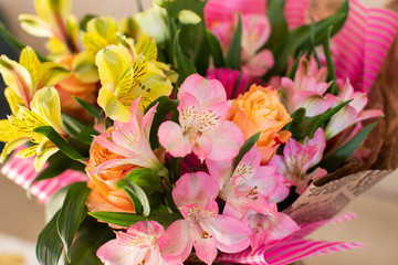 Naklejka na ściany i meble Beautiful elegant summer spring bouquet with roses and alstroemerias