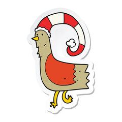sticker of a cartoon chicken in funny christmas hat