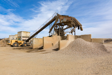 Fototapeta premium Quarry stone river or pebble for its transformation into sand