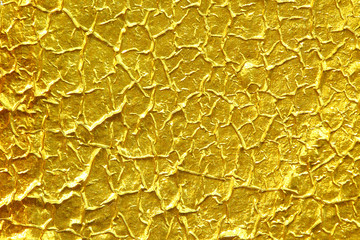 Shiny yellow leaf gold foil texture background