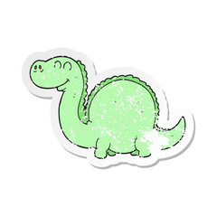 retro distressed sticker of a cartoon dinosaur
