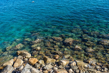Italy, Cinque Terre, Monterosso, HIGH ANGLE VIEW OF ROCKS IN SEA