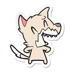 sticker of a laughing fox cartoon