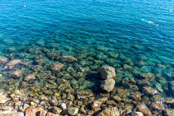 Italy, Cinque Terre, Monterosso, HIGH ANGLE VIEW OF ROCKS IN SEA