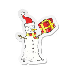 Obraz premium retro distressed sticker of a cartoon snowman