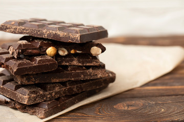 Chopped chocolate on rustic sackcloth