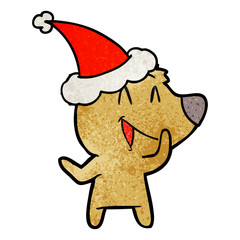 laughing bear textured cartoon of a wearing santa hat