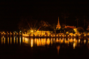 Fototapeta premium Sukhothai historical park and surrounding area example Wat Si Chum, Wat Traphang-Thong, Sorasak Temple in the midday and twilight