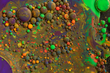 Bright colorful acrylic paint. Fantastic surface. Top view. Macro structure of Multicolored Bubbles Paint and Oil.