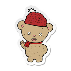 sticker of a cartoon bear in hat
