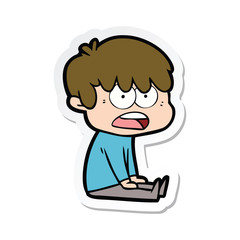 sticker of a worried cartoon boy