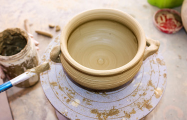 Clay pot on a pottery machine