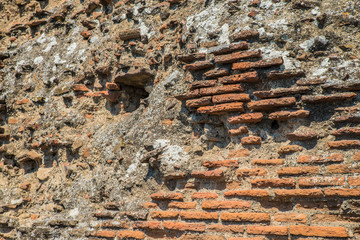 POMPEII, ITALY - 8 August 2015: Ruins of antique roman temple in Pompeii near volcano Vesuvius, Naples, Italy