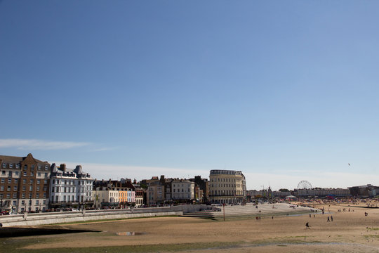 Visitors on Margate beach in Britain