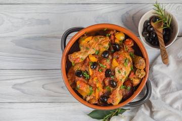 Pollo alla cacciatora- italian hunter-style chicken with onions,  tomatoes,  bell peppers, olives...