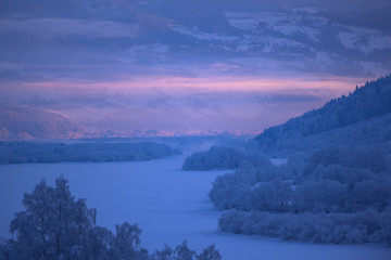Winter landscape early morning over the river