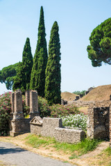 POMPEII, ITALY - 8 August 2015: Ruins of antique roman temple in Pompeii near volcano Vesuvius, Naples, Italy