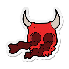 sticker of a cartoon halloween skull