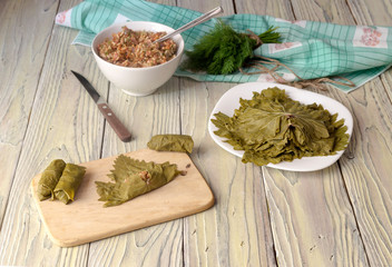 Preparation of dolmas in grape leaves