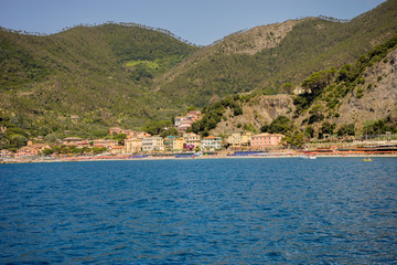 Obraz premium Italy, Cinque Terre, Monterosso, a large body of water with a mountain in the background