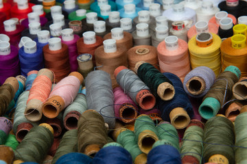 group of multicolored threads top view